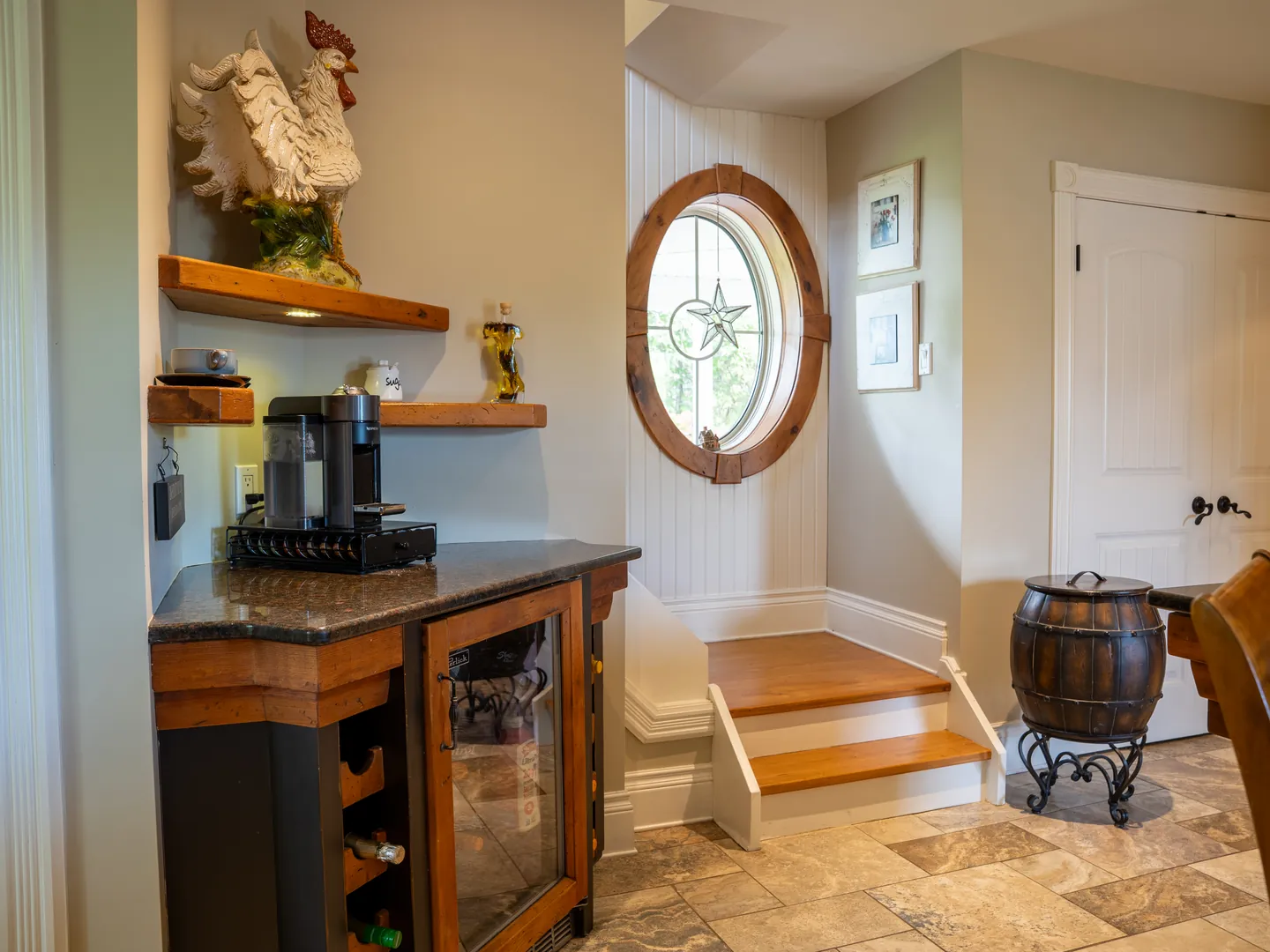 Service nook with a round leaded-glass window
