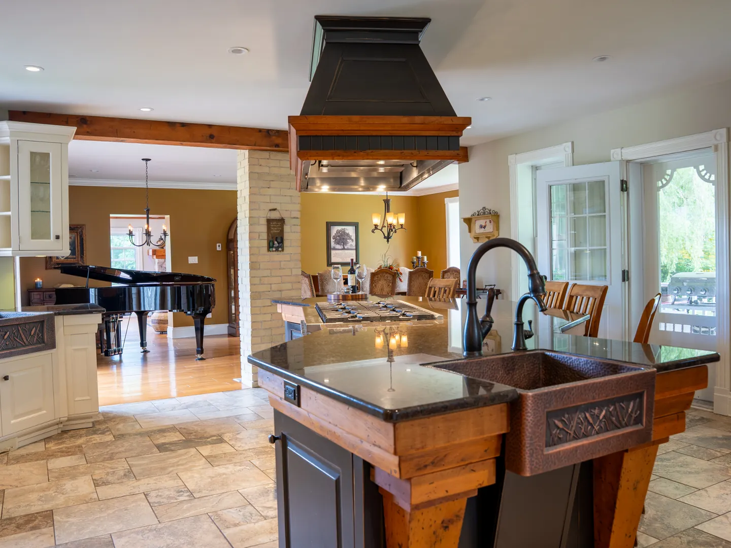 Kitchen island looking toward the adjoining piano room
