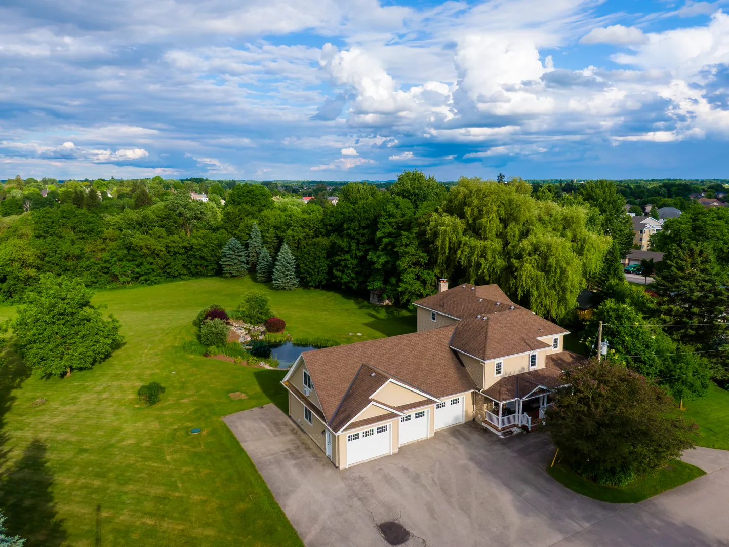Aerial view of the house and surrounding grounds