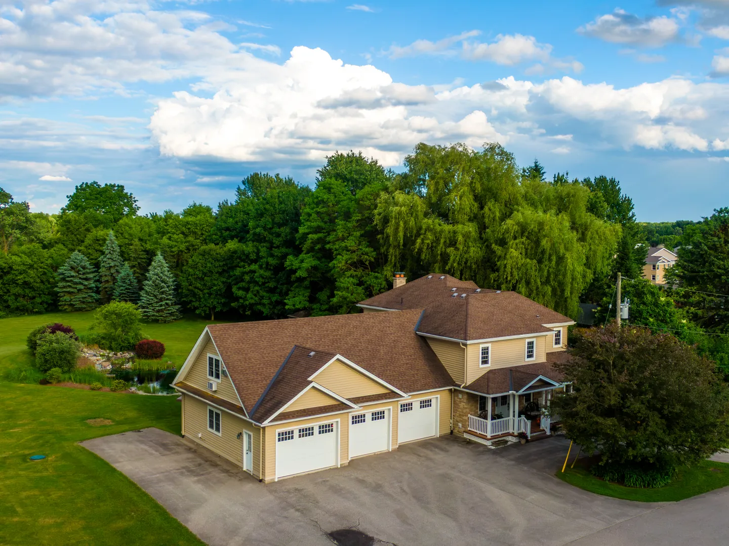 Raised aerial view of the house and lawn